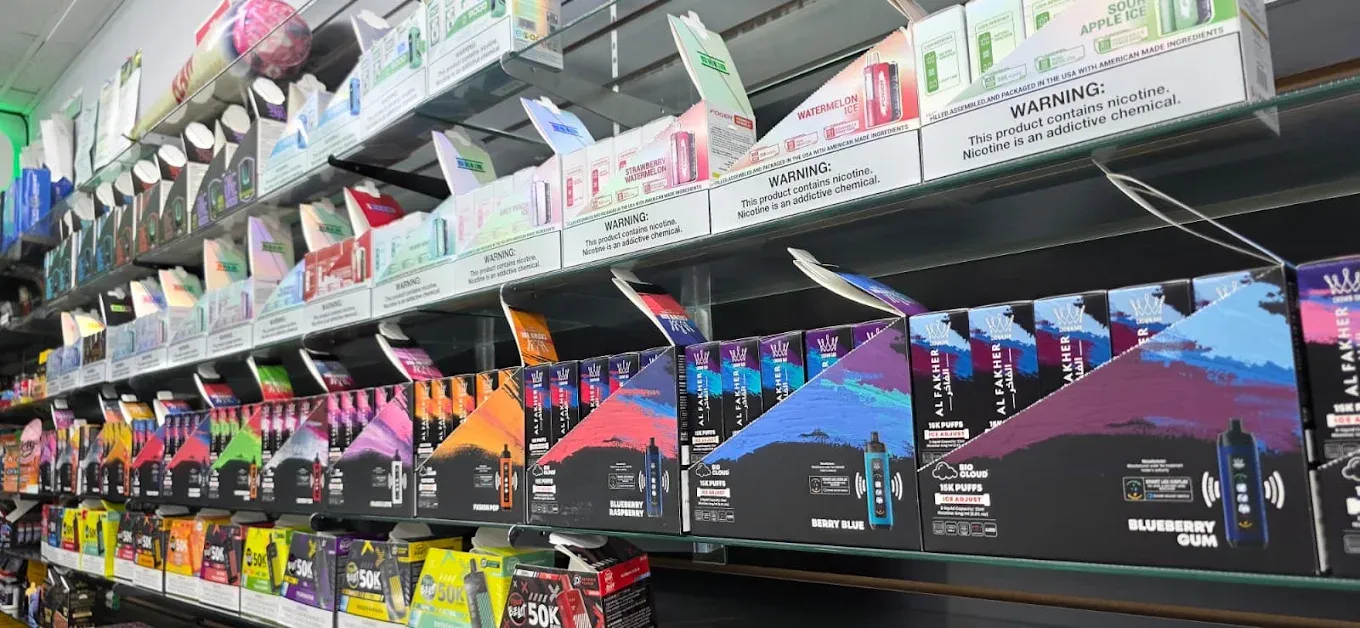 Disposable vape shelf wall at Smoke Drop Edgebrook, Houston