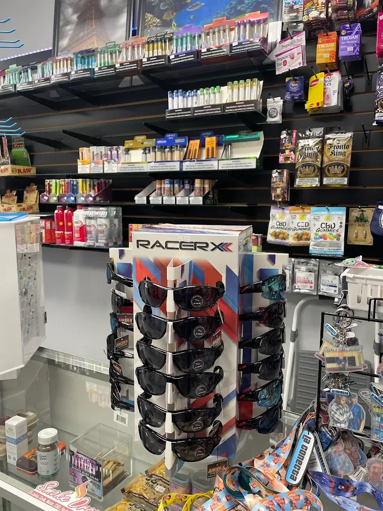Lighters, wraps and accessories wall at Smoke Drop Edgebrook, Houston