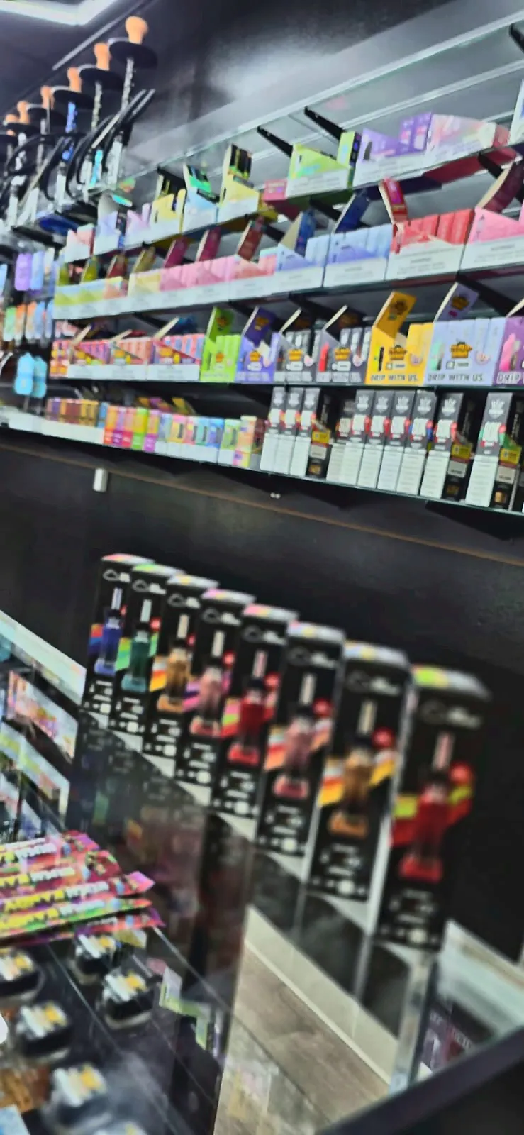 Disposable vape wall at Smoke Drop's 24-hour Hobby Airport store